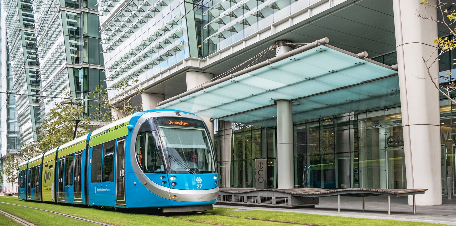 Midland Metro tram going past Snow Hill offices.